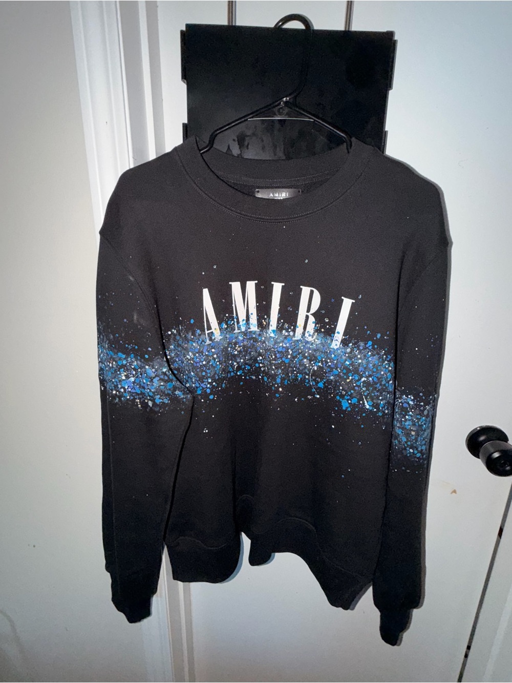 AMIRI Black Crewneck Sweatshirt with Blue Paint Splatter